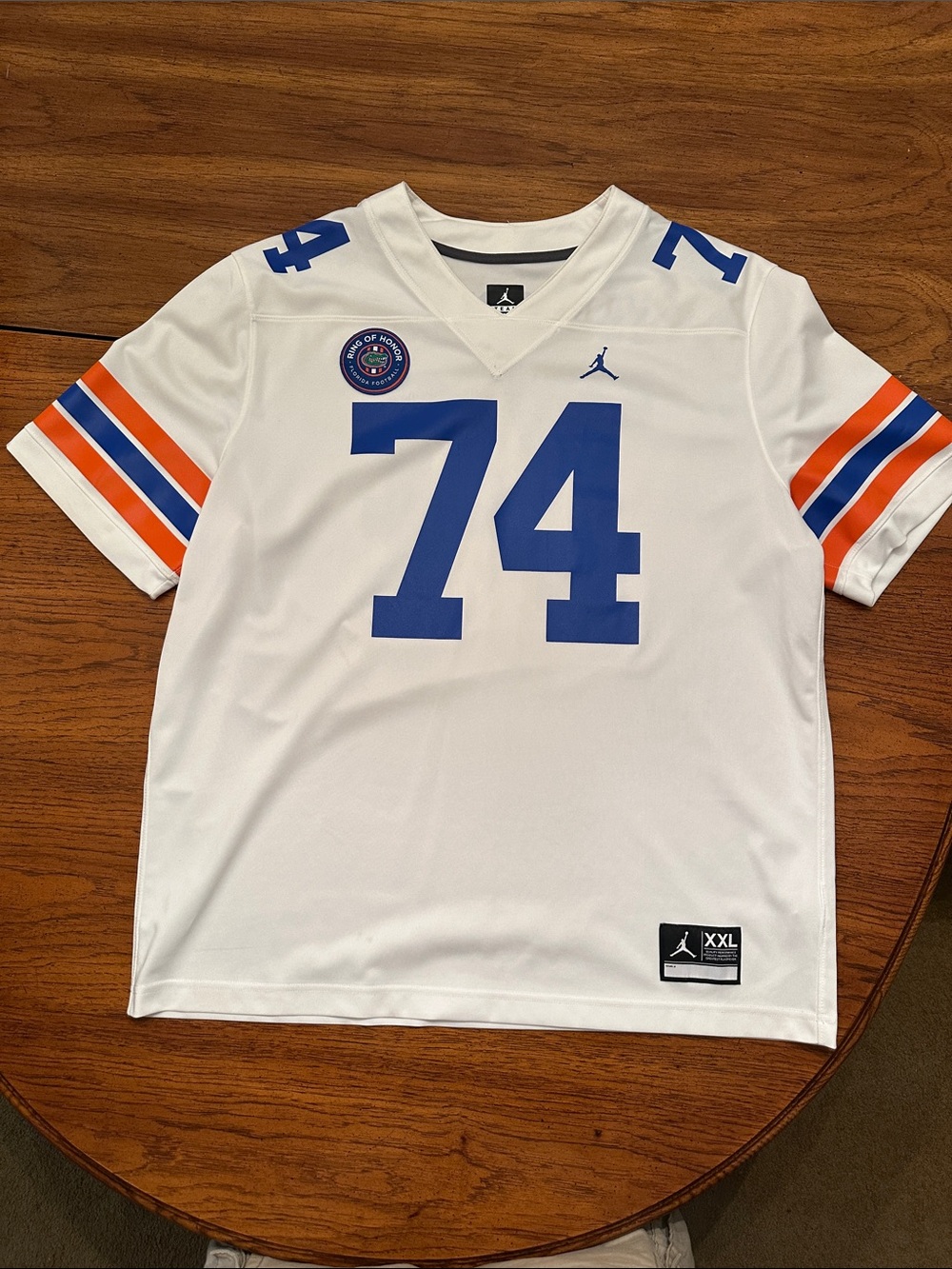 Jordan White Kids Football Jersey with Blue 74 and Orange Stripes